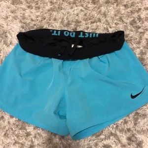 Turquoise Nike built in spandex shorts